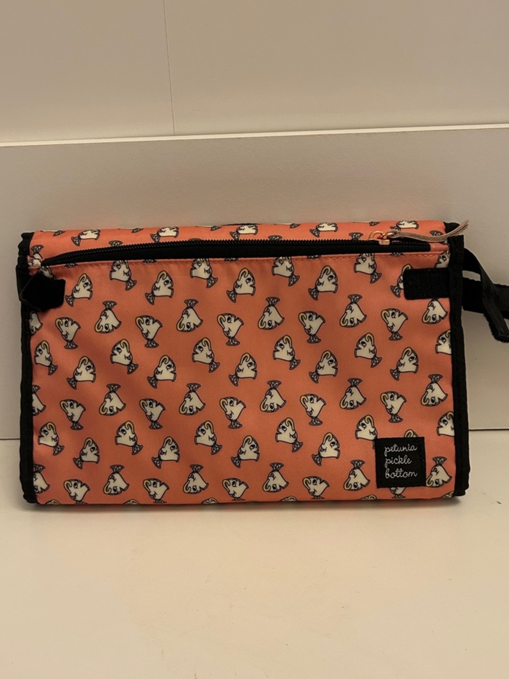 Petunia Pickle Bottom Coral Pouch with White Dog Print and Black Trim